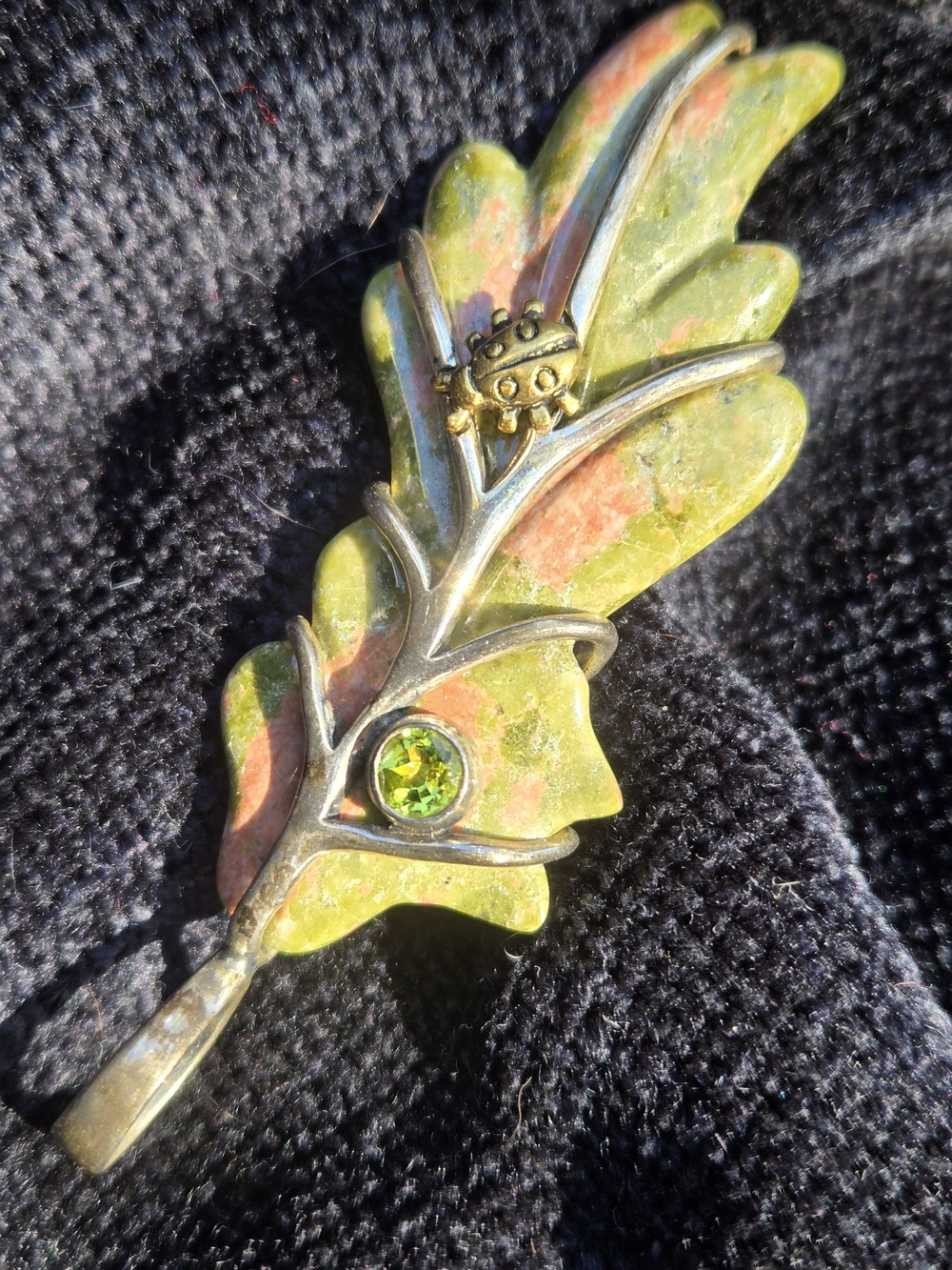 Leaf Shaped Stone Pendant with Ladybug Accent and Green Crystal